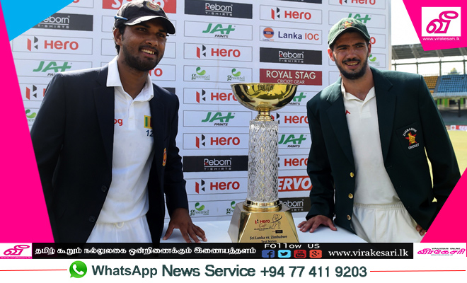 Dinesh-Chandimal-and-Graeme-Cremer-pose.