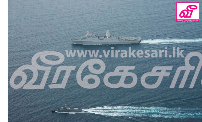 USS_Anchorage_Conducts_Exercise_at_Sea_w