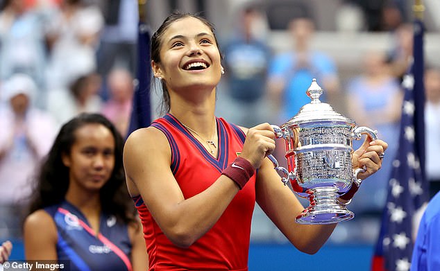 47799115-9969593-Emma_Raducanu_gleams_as